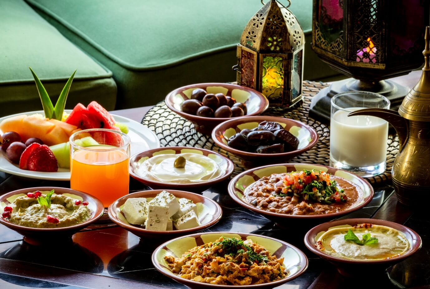 Arab food served in various  plates with drinks. Dubai, UAE.